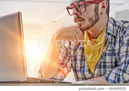 Hipster guy use laptop 48440930