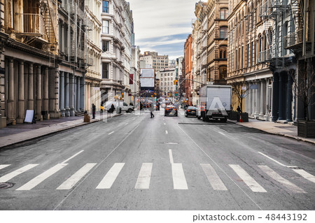 New York City asphalt road on busy intersection New York City asphalt road on busy intersection 48443192