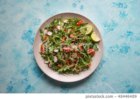 Fresh organic salad with arugula and quinoa. 48446489