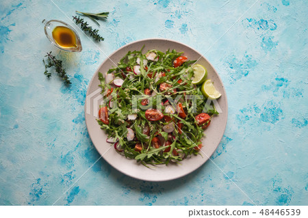 Fresh organic salad with arugula and quinoa. 48446539