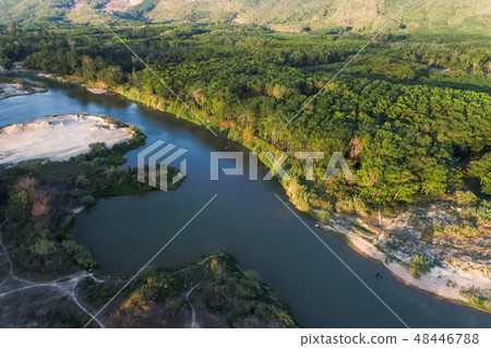 Green of rain forest with curve of river sunrise 48446788