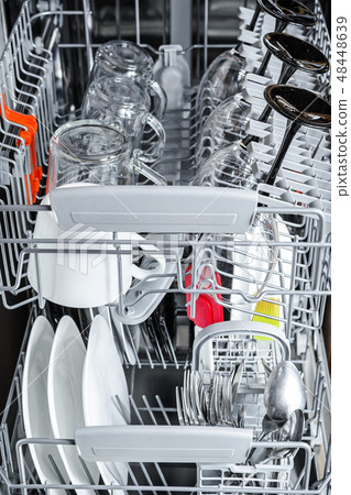 clean dishes inside the dishwasher clean dishes inside the dishwasher 48448639