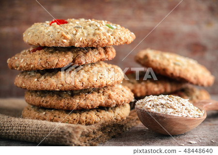 Oatmeal cookies on a wooden table 48448640