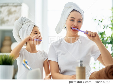 family are brushing teeth 48448988