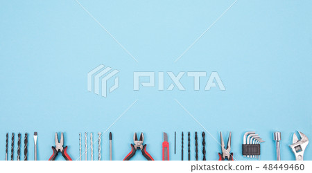 Set of different tools on blue background Set of different tools on blue background 48449460