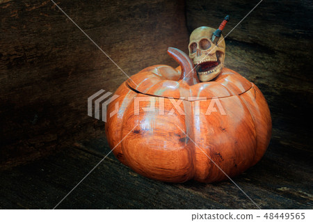 skull on pumpkin made of wood in Halloween day skull on pumpkin made of wood in Halloween day 48449565