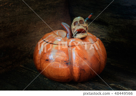 skull on pumpkin made of wood in Halloween day skull on pumpkin made of wood in Halloween day 48449566