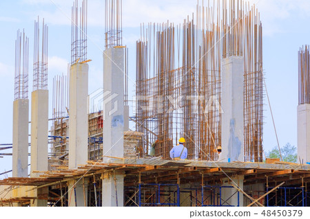 construction laborer team working high building  48450379