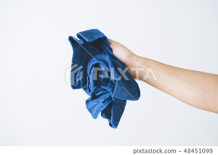 Hand holding microfiber fabric on white background 48451099