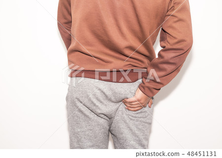 man having ache hemmoroid on white background. man having ache hemmoroid on white background. 48451131