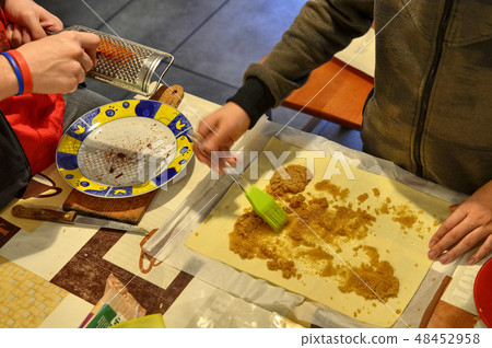 Preparation of apple strudel in the family 48452958