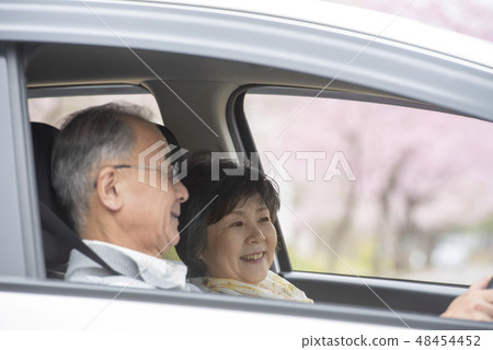 Senior couple drive 48454452