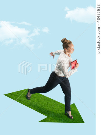 Businesswoman holding laptop walking on graphic stair, start up business concepts. 48455618