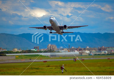 Jetliner taking off Jetliner taking off 48458809