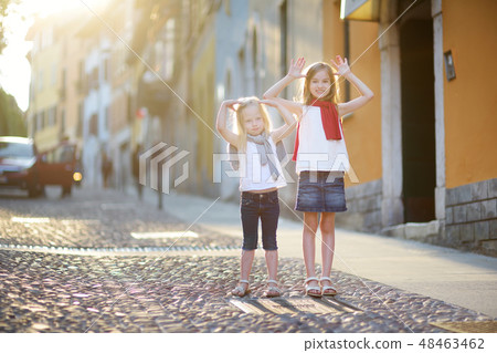 Two sisters having fun in Desenzano del Garda 48463462