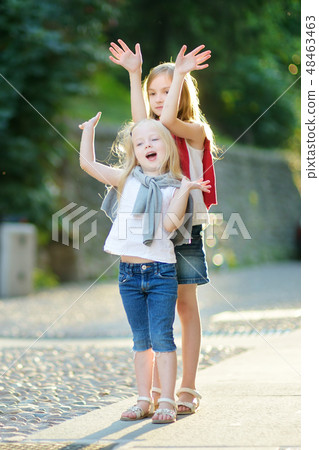 Two sisters having fun in Desenzano del Garda 48463463
