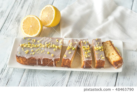 Lemon cake decorated with pistachios Lemon cake decorated with pistachios 48463790