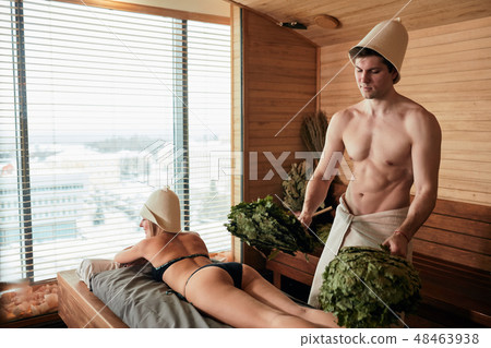 Sauna, therapy, relaxation, and health concept. Sauna, therapy, relaxation, and health concept. 48463938