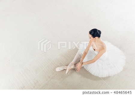 top view photo. talented ballerina has finished her wonderful performance top view photo. talented ballerina has finished her wonderful performance 48465645