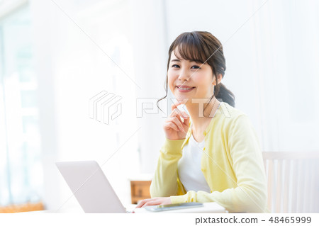 Young lady who operates personal computer internet girls lifestyle female portrait Young lady who operates personal computer internet girls lifestyle female portrait 48465999