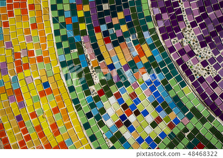 Decorative the mosaic on the wall background. Decorative the mosaic on the wall background. 48468322