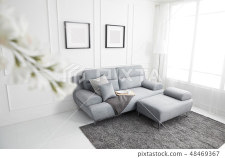 Living room with gray fabric sofa 48469367