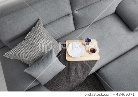 Living room with gray fabric sofa 48469371