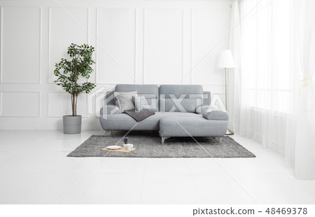 Living room with gray fabric sofa Living room with gray fabric sofa 48469378
