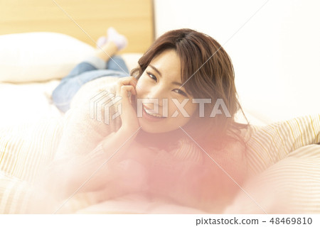 Young lady relaxing lifestyle holiday cheeks Young lady relaxing lifestyle holiday cheeks 48469810