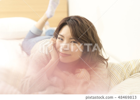 Young lady relaxing lifestyle holiday cheeks Young lady relaxing lifestyle holiday cheeks 48469813