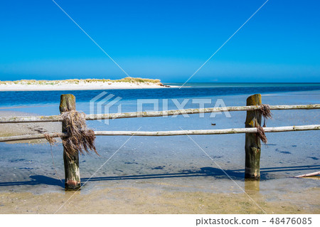 Fence on shore of the Baltic Sea 48476085