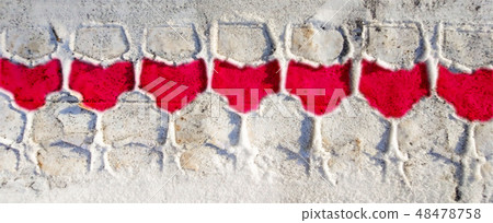 Tire track on a snow with red wine glass patterns Tire track on a snow with red wine glass patterns 48478758