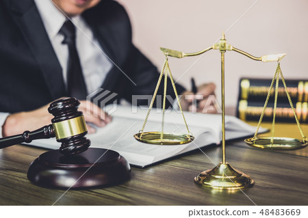 Judge gavel with Justice lawyers, Gavel on wooden table and Coun Judge gavel with Justice lawyers, Gavel on wooden table and Coun 48483669