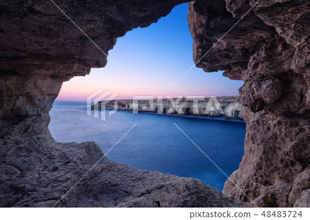 Sea cave at dusk on Cape Greco, Ayia Napa, Cyprus 48483724
