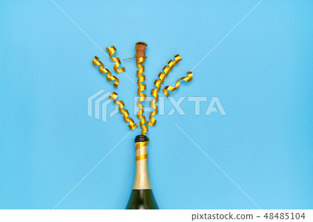 Creative photo of a champagne bottle with splashes 48485104