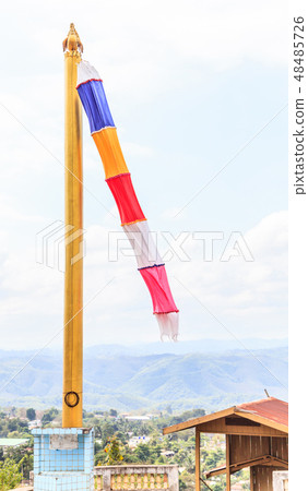 Wind Wavering colorful Buddhist flag in temple 48485726