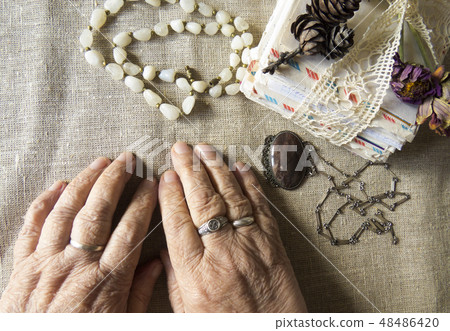 Hands of an elderly person. Hands of an elderly person. 48486420