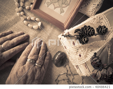 Hands of an elderly person. Hands of an elderly person. 48486421