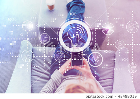 LiFi theme with man using a smartphone 48489019