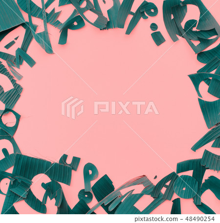 Copy space frame from letter green tropical leaves 48490254