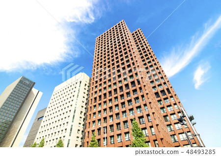 Landscape of the office town looking up at a skyscraper Landscape of the office town looking up at a skyscraper 48493285