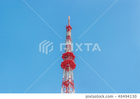 Telecommunication red tower with antennas Telecommunication red tower with antennas 48494130