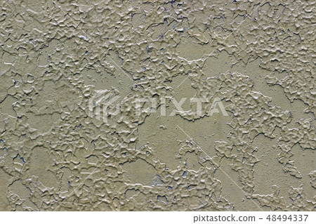 Green metallic background with peeling paint.  48494337