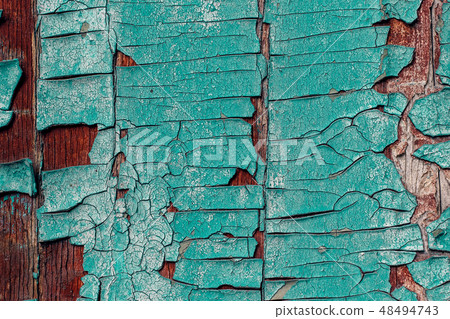 Old wooden surface with pieces of peeling blue Old wooden surface with pieces of peeling blue 48494743