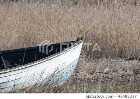 Front view of an old fishing boat 48498317