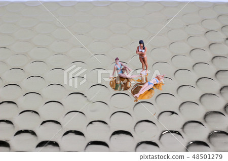 fun of Tiny toy in the beach fun of Tiny toy in the beach 48501279