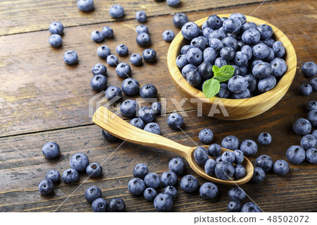 blueberries are scattered on the table blueberries are scattered on the table 48502072