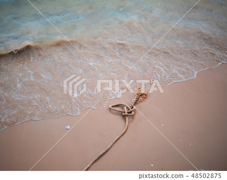 String rope on the beach 48502875