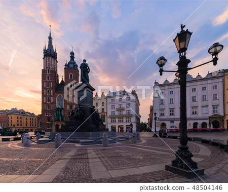 Purple sunrise in the main square of Krakow Purple sunrise in the main square of Krakow 48504146