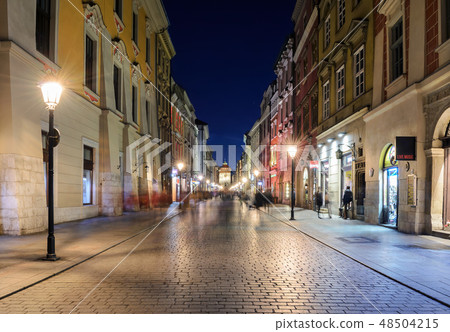 Colorful street in Krakow in the evening. 48504215